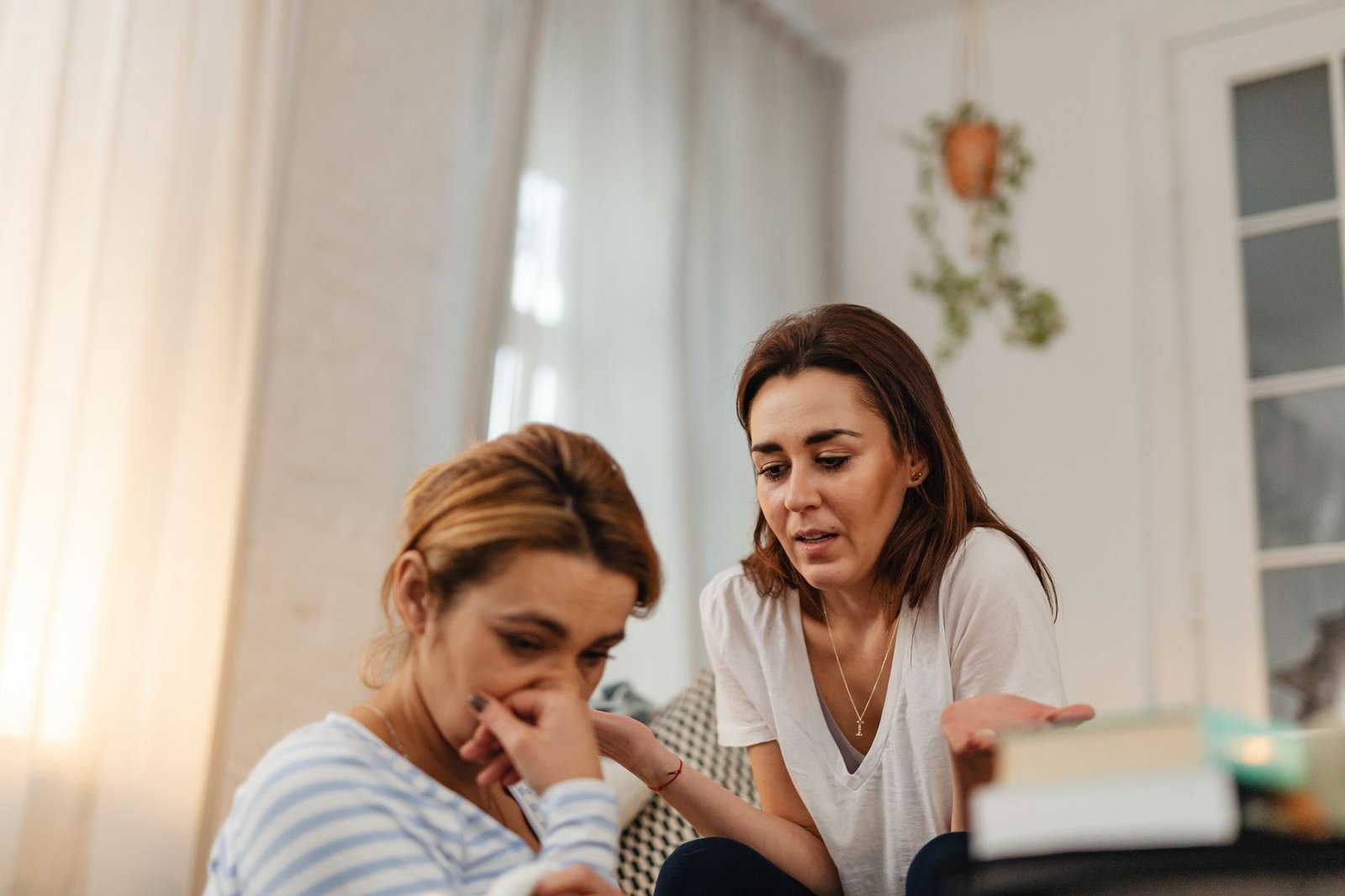 carer burnout, family member talking with an older relative at home