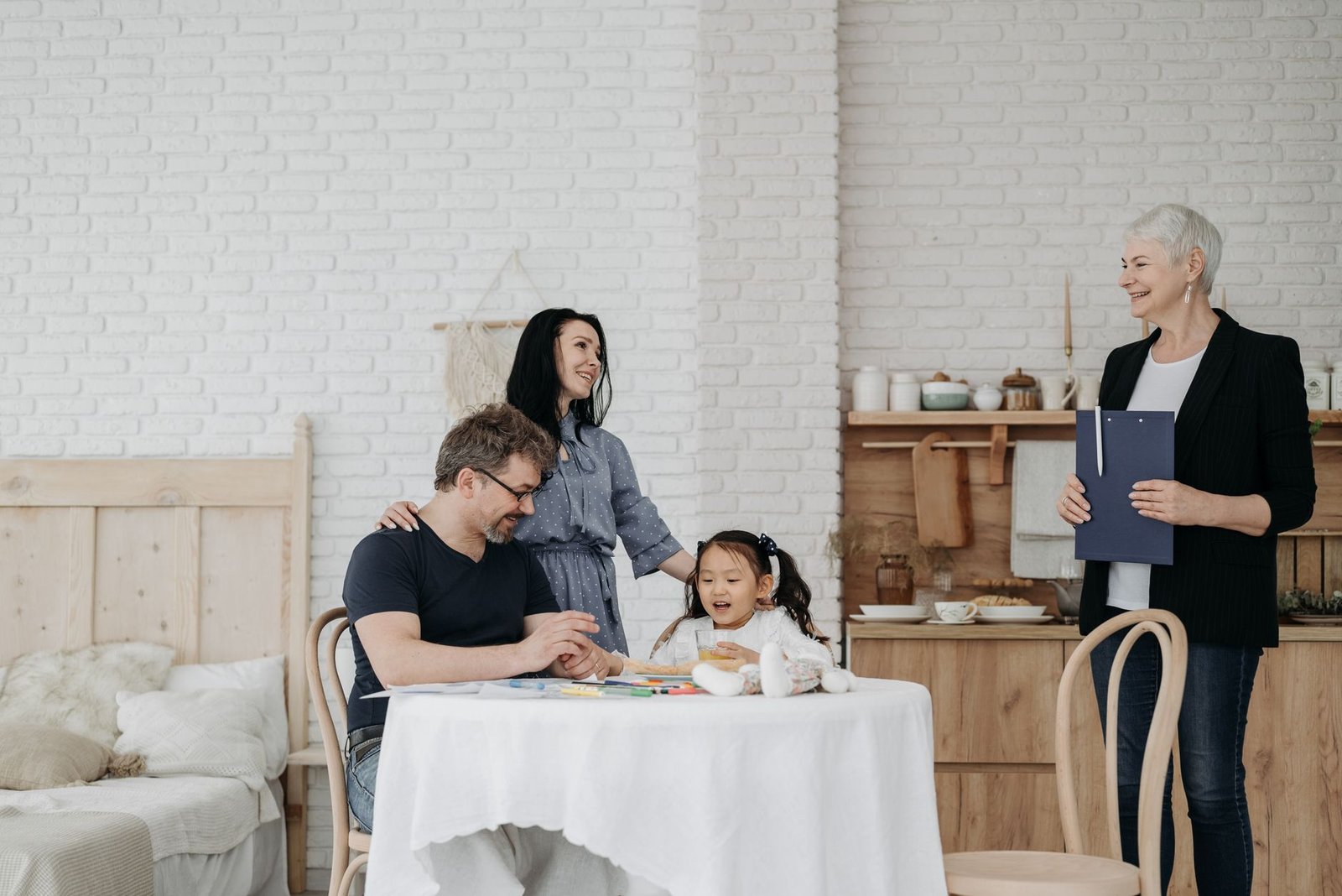 Hospital discharge care in Ealing, family discussing a care plan at home