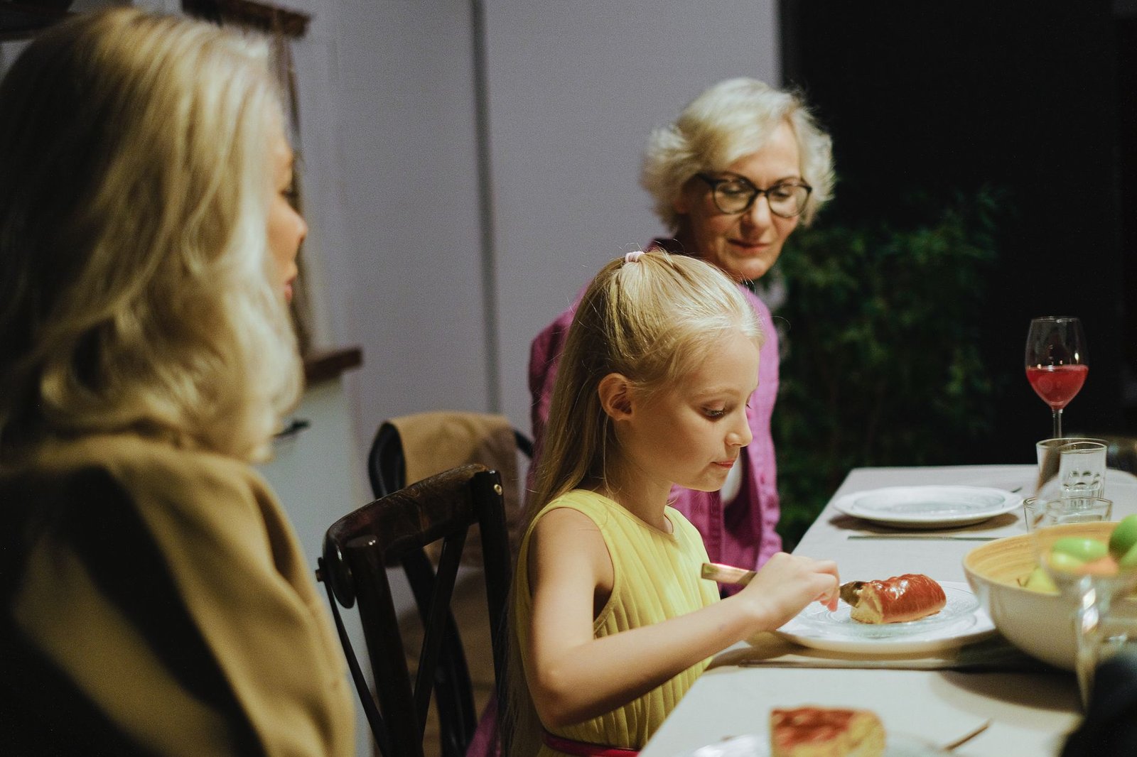 palliative care at home with a family member receiving calm support in their living room